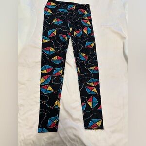 LuLaRoe women Leggings with Kite Design in Black, Red, Yellow, and Blue